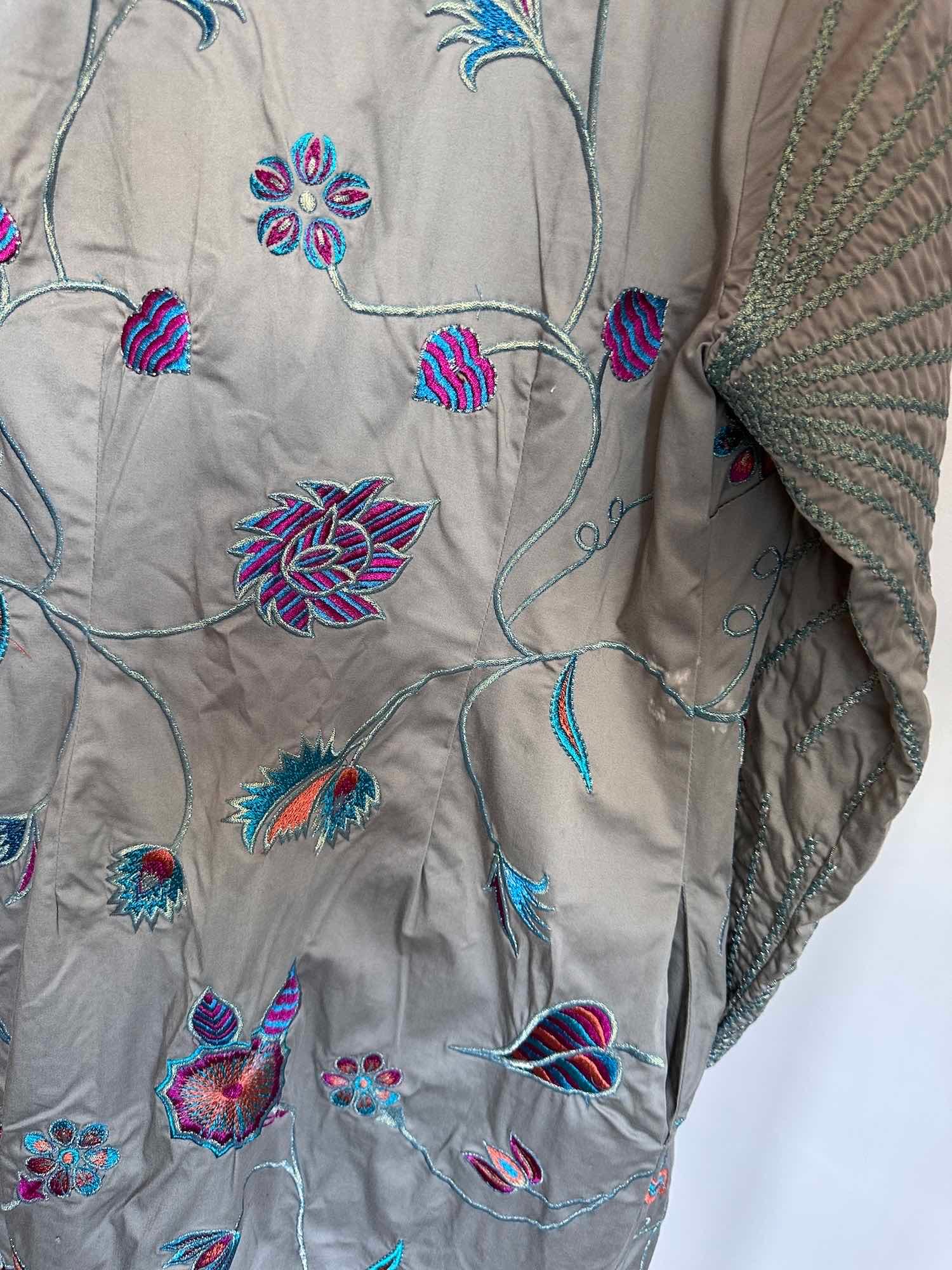 manteau niza occasion petit defaut